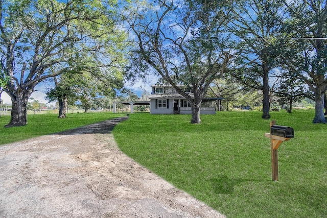 view of front facade with a front yard