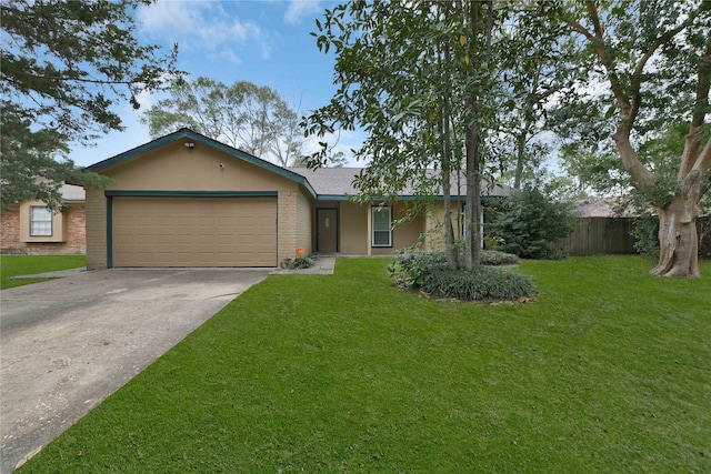 ranch-style home featuring a garage and a front yard