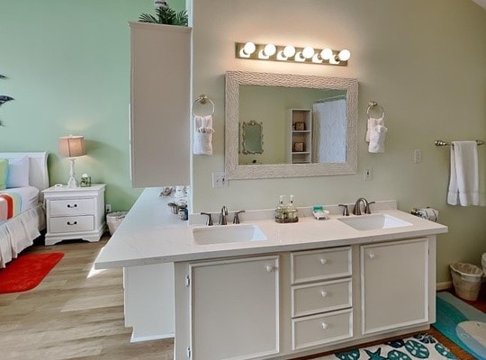 bathroom featuring hardwood / wood-style floors and vanity