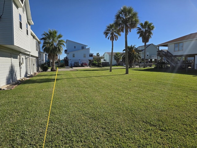 view of yard featuring a garage