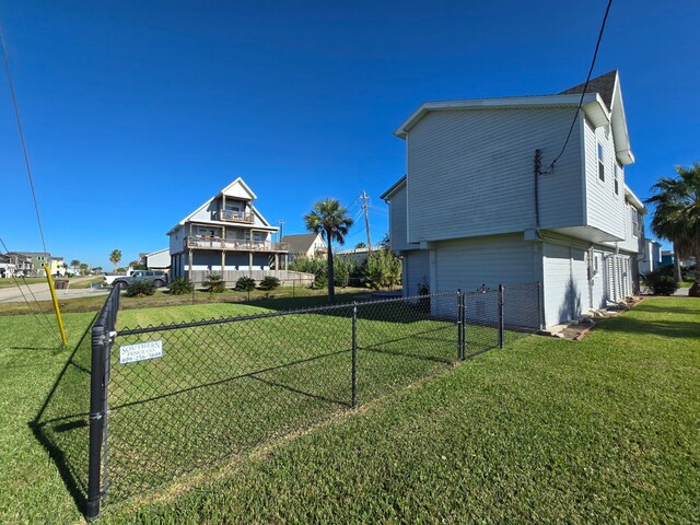 view of property exterior with a lawn and a garage