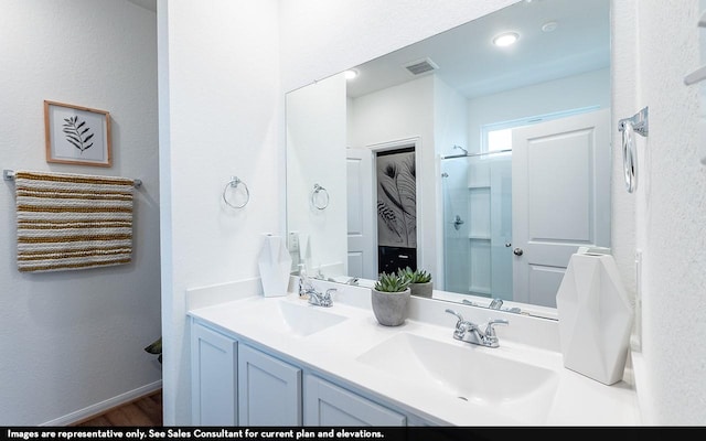 13113 Sapphire Lake Ln, Texas City, TX 77568 - full bath featuring double vanity, a shower, and wood finished floors