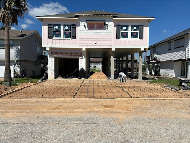 view of front of property with a carport