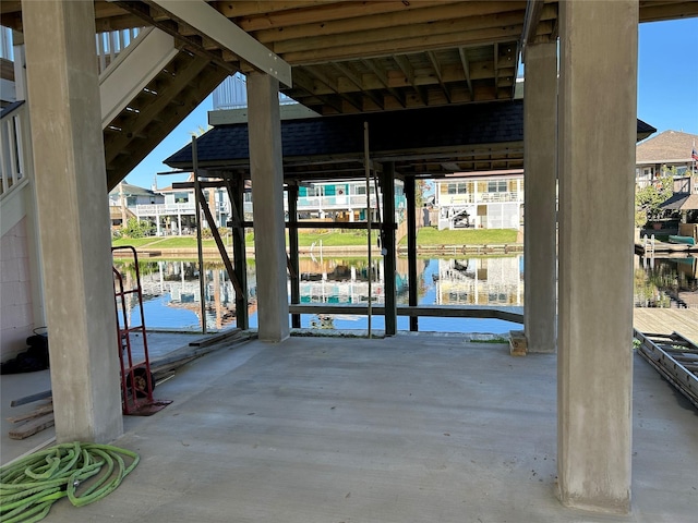 view of patio / terrace with a boat dock