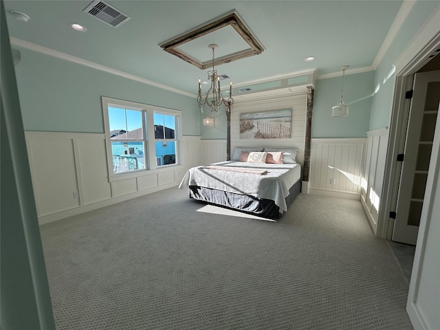 carpeted bedroom with a notable chandelier and crown molding