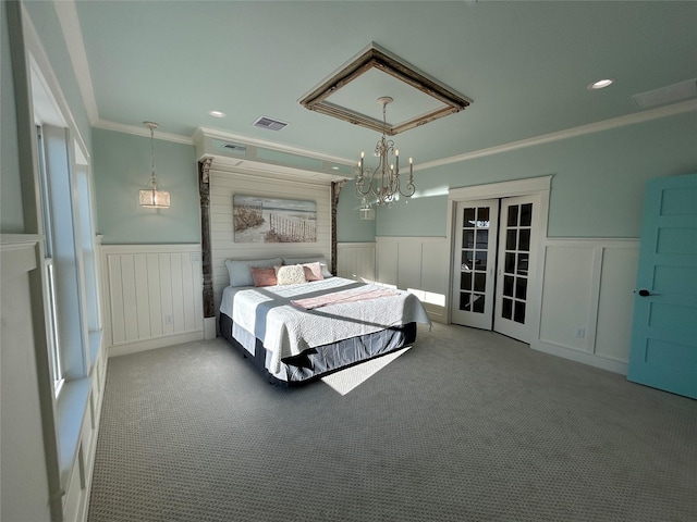 bedroom with crown molding, french doors, light carpet, and an inviting chandelier