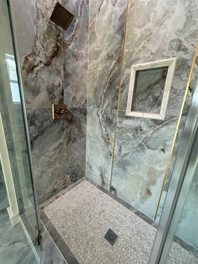 bathroom with an enclosed shower