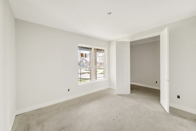 empty room with light colored carpet