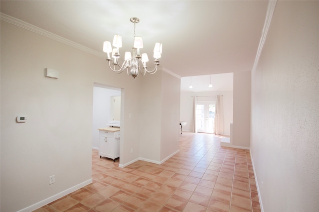 interior space with a chandelier and ornamental molding