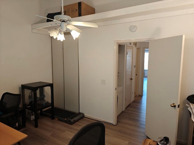 office featuring hardwood / wood-style flooring and ceiling fan