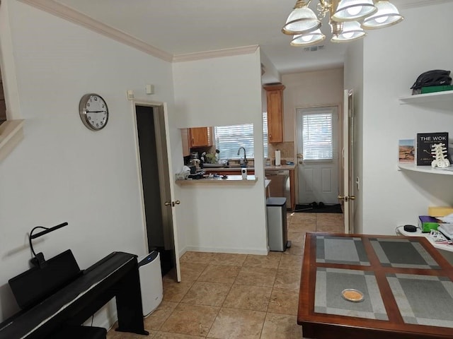 kitchen with crown molding, dishwasher, hanging light fixtures, and an inviting chandelier