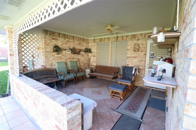 view of patio with ceiling fan