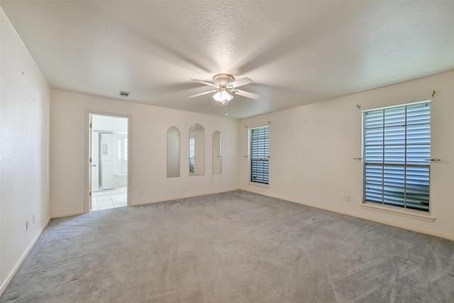 102 N Noble Rd, Texas City, TX 77591 - spare room with carpet flooring, a ceiling fan, and baseboards
