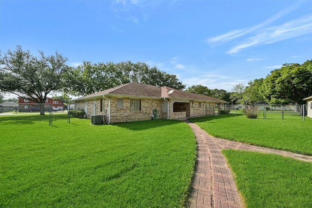 102 N Noble Rd, Texas City, TX 77591 - back of property with central AC unit and brick siding