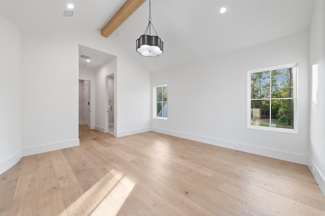 unfurnished dining area with light wood-type flooring and vaulted ceiling with beams