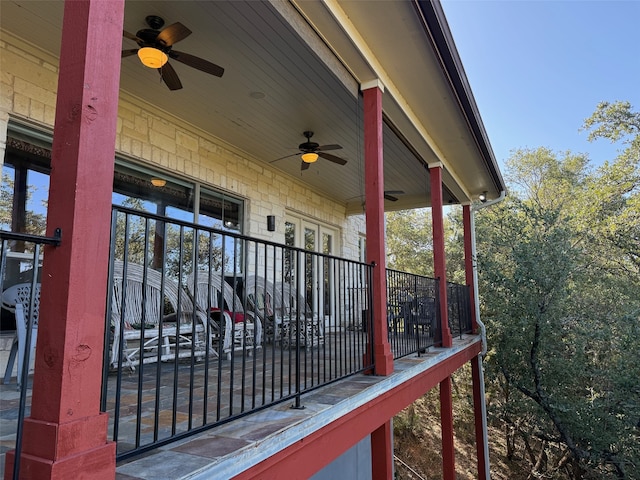 exterior space with ceiling fan and a porch