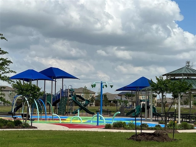 view of playground featuring a lawn