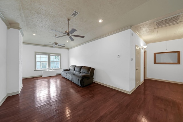 unfurnished living room with crown molding, a textured ceiling, and dark wood-type flooring