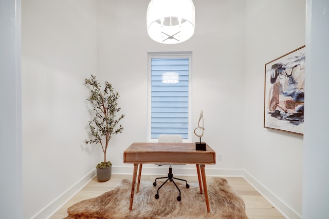 home office featuring light hardwood / wood-style floors