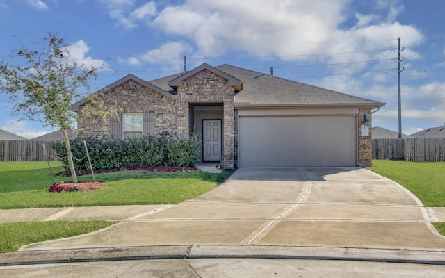 ranch-style home featuring a garage and a front lawn