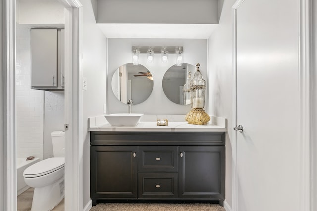 full bathroom featuring vanity, toilet, and bathing tub / shower combination