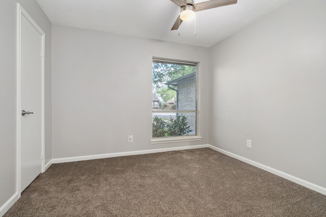 empty room with carpet flooring and ceiling fan