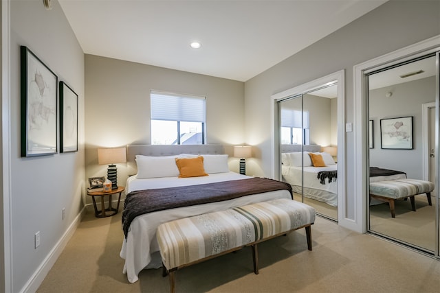 carpeted bedroom featuring a closet