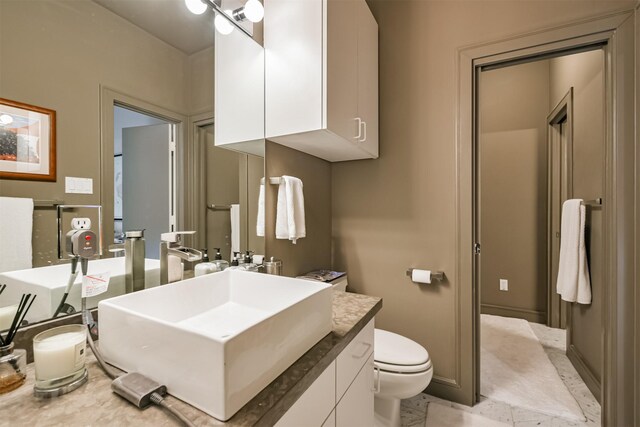 1 Alabama Ct, Houston, TX 77027 - bathroom featuring vanity and toilet