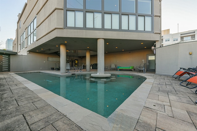 view of pool featuring a patio