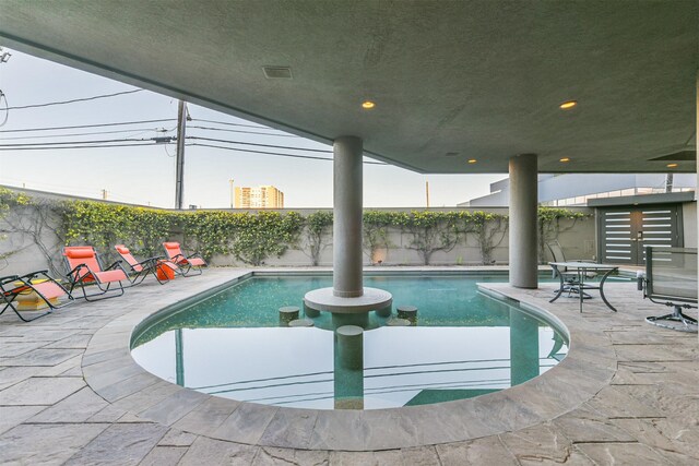 1 Alabama Ct, Houston, TX 77027 - view of swimming pool featuring a fenced backyard and a patio