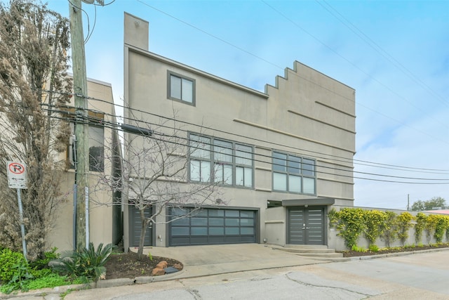 view of building exterior featuring a garage