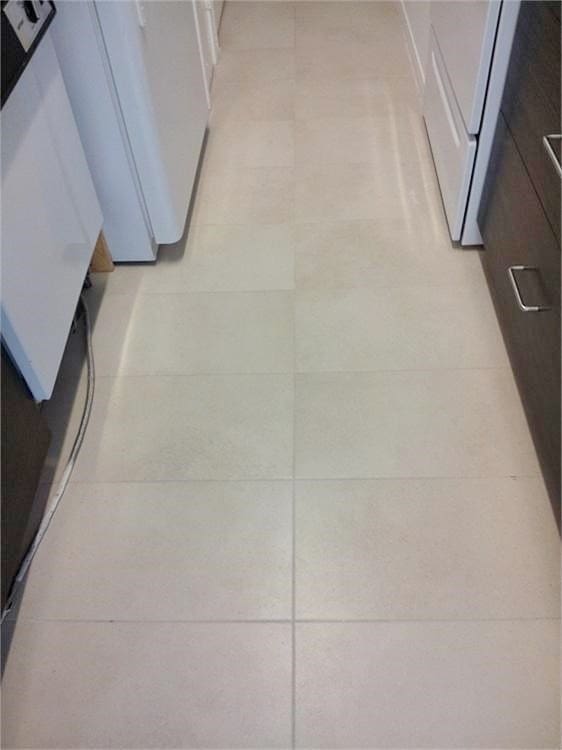 hallway featuring light tile patterned floors