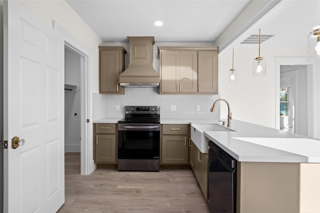 kitchen with kitchen peninsula, custom exhaust hood, decorative light fixtures, dishwasher, and stainless steel electric range oven