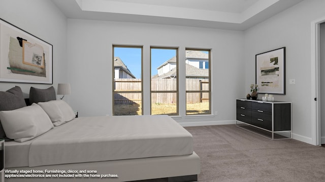 bedroom featuring carpet