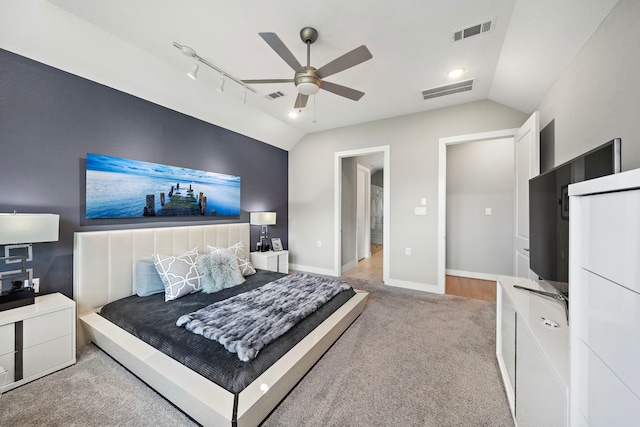 bedroom with carpet, ceiling fan, and lofted ceiling