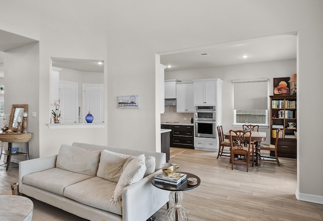 living room featuring light hardwood / wood-style floors