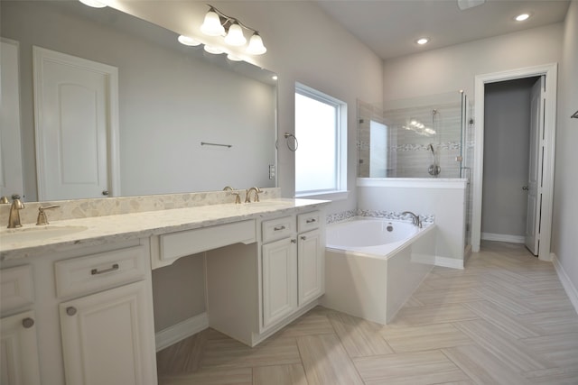 bathroom with vanity and plus walk in shower