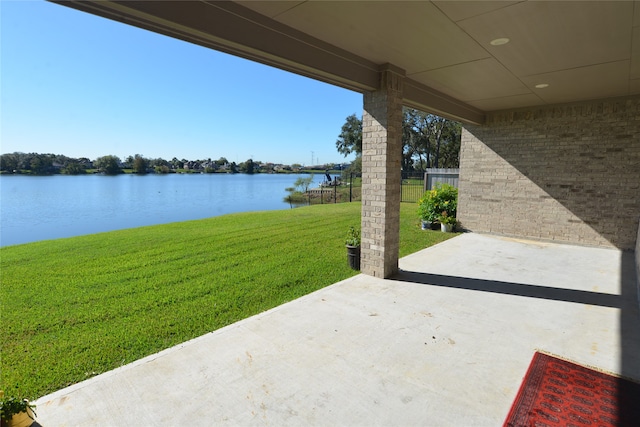 view of patio featuring a water view