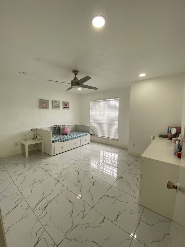 unfurnished bedroom featuring ceiling fan