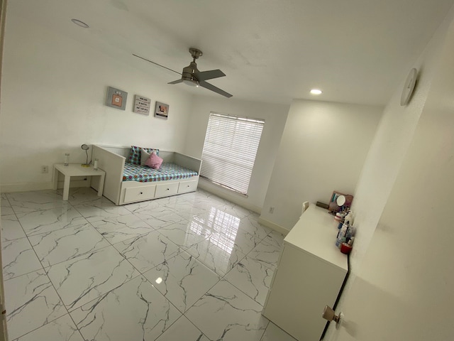 unfurnished bedroom featuring ceiling fan