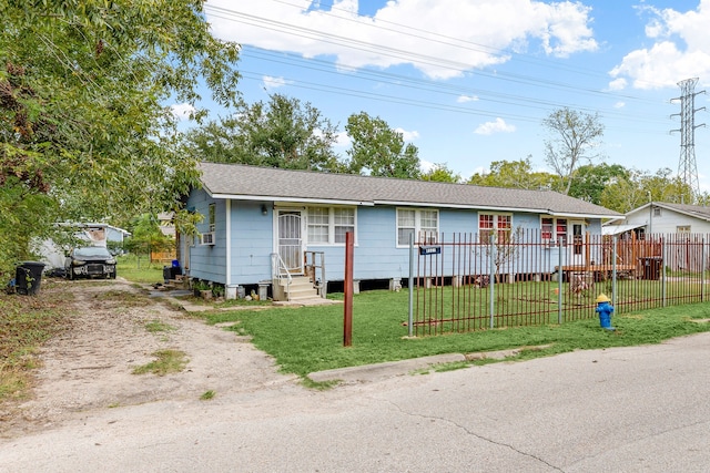 view of front of home with a front lawn