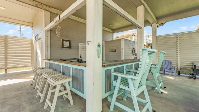 view of patio / terrace featuring exterior bar