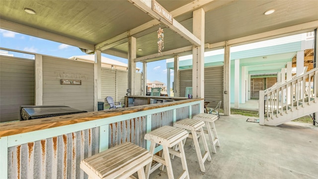 view of patio / terrace featuring exterior bar