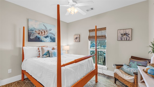 bedroom with wood-type flooring, access to outside, and ceiling fan