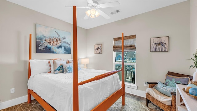 bedroom with ceiling fan and hardwood / wood-style floors