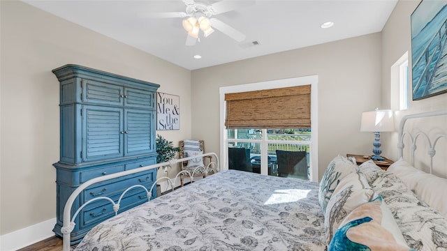 bedroom featuring wood-type flooring and ceiling fan