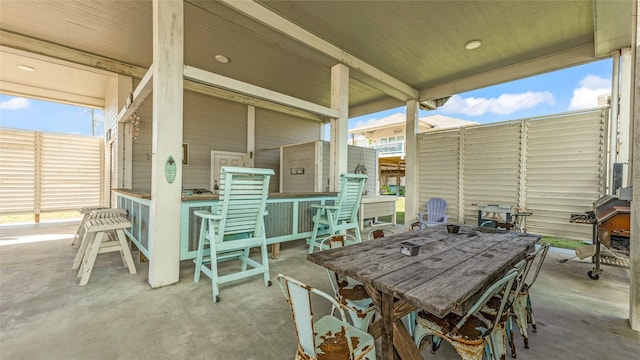 view of patio featuring a bar