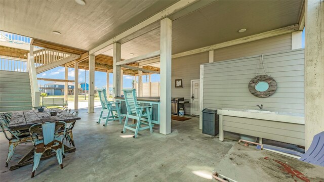 view of patio / terrace featuring an outdoor bar