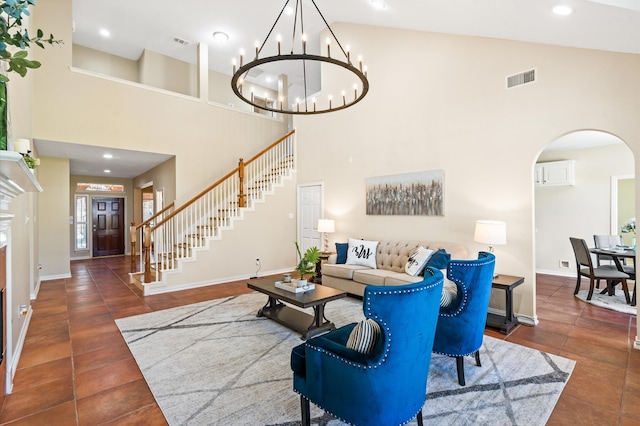 tiled living room featuring high vaulted ceiling