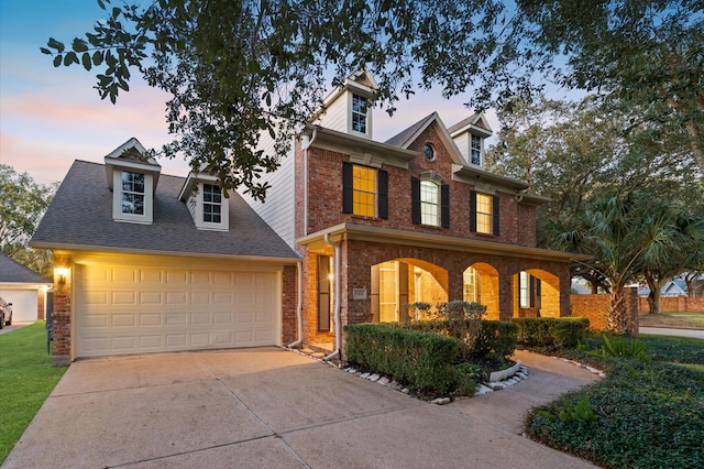 view of front of home with a garage